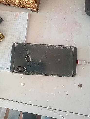 pitiminutka islenmis: Xiaomi Mi A2 Lite, rəng - Qara, 
 Barmaq izi — 1