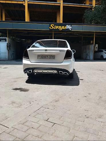 traxtor satisi: Daewoo Gentra sedan – ağ rəng, şəhər və magistral üçün universal rahat — 3