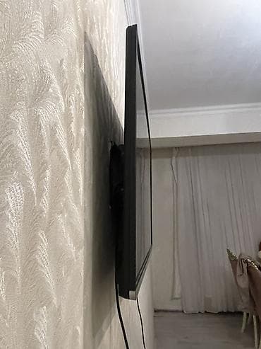televizo: Divar asılqanlı LED televizor - Ekran: təxminən 40–43 düym, nazik — 2