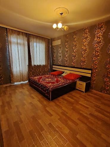 Mənzilin təsviri: - Geniş yataq otağı: iri ikinəfərlik çarpayı