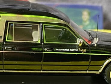metbex tavan modelleri: Коллекционная модель Mercedes-Benz 200 W123 Hearse black 1982 Schuco — 24