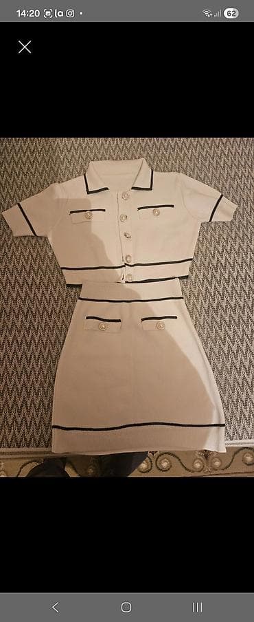 idman dest: İki hissəli qadın dəst: - Rəng: açıq bej, qara zolaq və haşiyələrlə - — 1