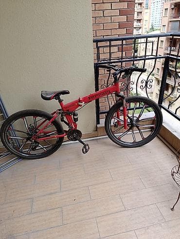 elektrik velosipedler: Qırmızı rəngdə qatlanan dağ velosipedi - Yığcam qatlanan çərçivə — 1