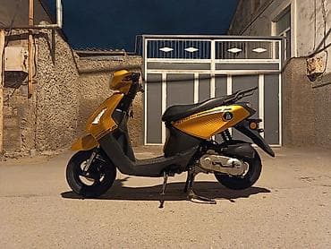 daewoo nexia 2011: Şəhər içi sürüş üçün praktik və qənaətcil skuter. Texniki və dizayn — 6