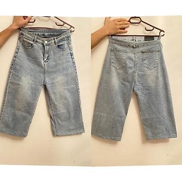 Dəstlər: Açıq mavi rəngdə denim şort - Model: geniş kəsimli, dizdən aşağı — 1