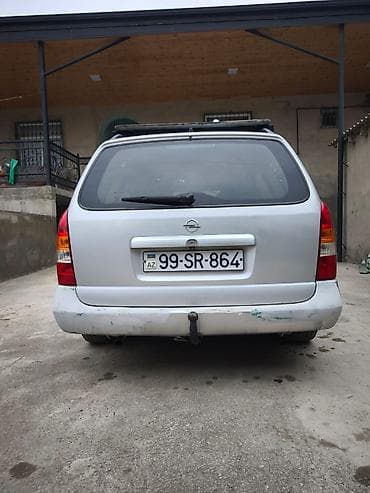 kia optima 2013: Opel Astra Caravan (universal) – gümüş rəngli kuzov, 5 qapı, dam — 10