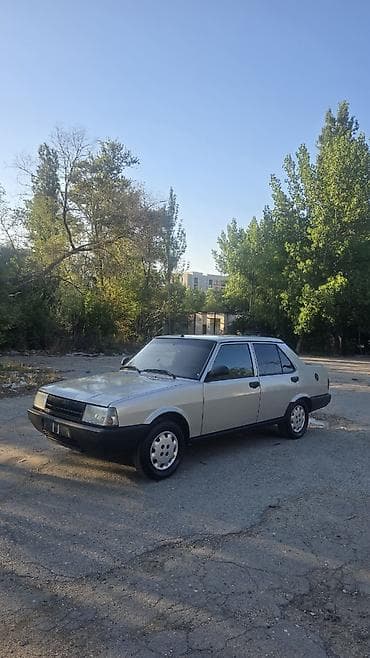 avcarka satılır: Model: Tofaş Şahin (sedan) Rəng: Gümüşü/boz, qara bamperlər Kuzov: 4 — 1
