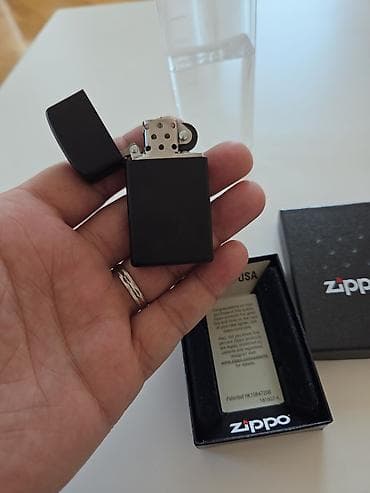 smart saat sim kart: Orginal zippo black mat slim madelidi cizig eziy yoxdu usdunde — 1