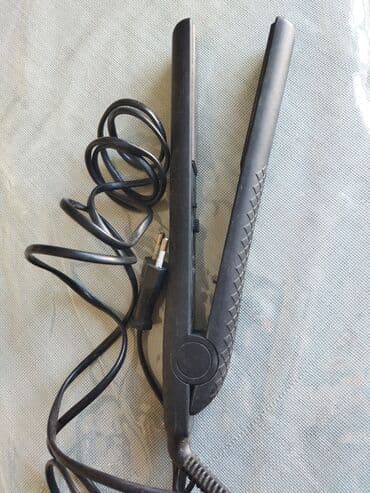 dyson airwrap baku electronics: Qara rəngli saç düzləşdiricisi saça istiliklə düz forma vermək üçün — 2