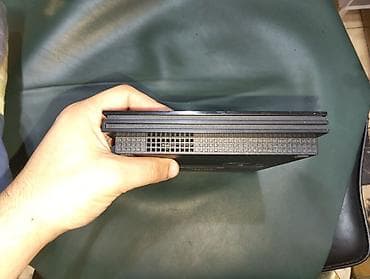 PlayStation 2 (PS2) komplekti - Konsol: Sony PlayStation 2 Slim (üst — 10