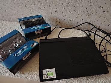 var box: Sony PlayStation 3 Super Slim konsolu + 2 ədəd DualShock 3 simsiz pult — 4