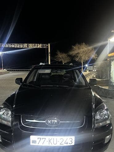 opel astra kompressor: Kia Sportage: 2 l | 2007 il Krossover — 1