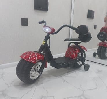 Ördümçək adam dizaynlı, qırmızı və qara rəngli uşaq elektrikli skuter lalafo.az -da Ördümçək adam dizaynlı, qırmızı və qara rəngli uşaq elektrikli skuter