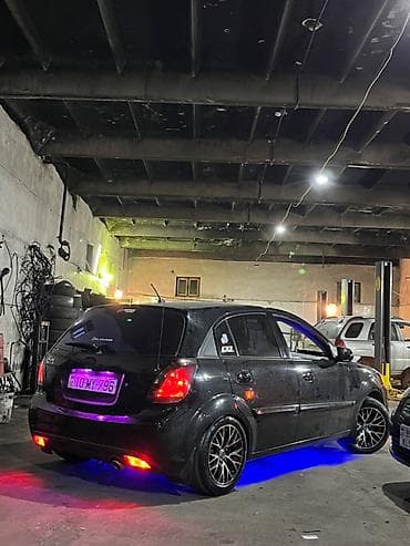 disk qabi: Kia Rio hatchback, qara rəng, maşın ideal veziyyetdedi maşını — 5