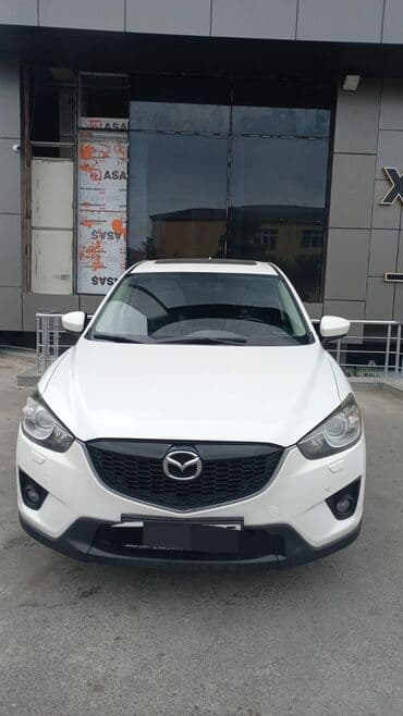 Aksesuarlar və tüninq: Mazda CX-5, ağ rəngli, benzinli krossover. Texniki və dizayn: - — 1