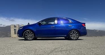 park maşını: Kia Cerato: 2 l | 2009 il Sedan — 6