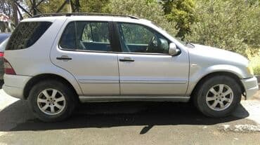 Mercedes-Benz ML 320: 3.2 l | 1999 il Ofrouder/SUV — 2