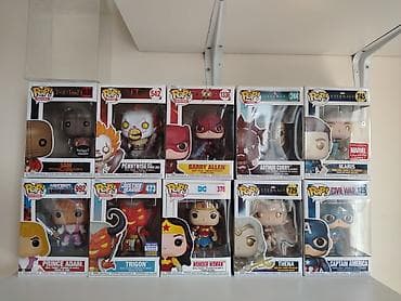 uşaqlar ucun oyuncaqlar: Şəkildə müxtəlif personajlara aid **Funko Pop! vinil fiqurlar — 1