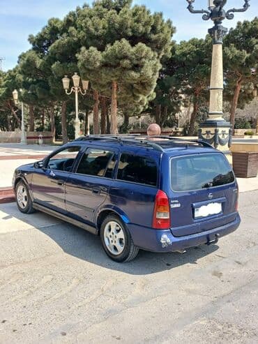 nissan oluxana baksol: Opel Astra: 2 l | 1999 il 600000 km Universal — 10