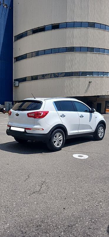 Kia Sportage: 2 л | 2013 г. Внедорожник — 3