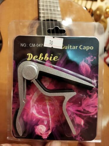 ucuz gitaralar: Kapo klassik, akustik və elektro gitaralar üçün uyğundur. Ünvan:Nizami — 1