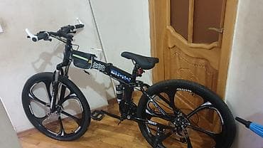 Qatlanan dağ velosipedi – 26” magnezi təkər diskləri ilə,sürülməyib