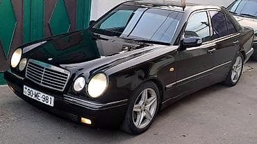 tap az vaz: Mercedes-Benz E‑Sinfi (W210) sedan – qara rəng Xarici: - Klassik W210 — 2