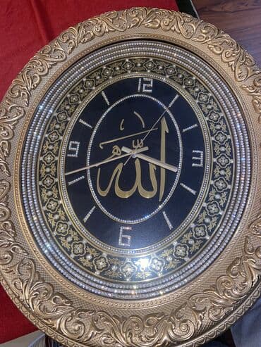 Süni güllər: Divar saatı. İşləkdir. 25 m — 1