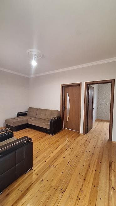 Daşınmaz əmlak: 3 otaqlı mənzil – geniş zal, iki yataq otağı və ayrı mətbəx — 5