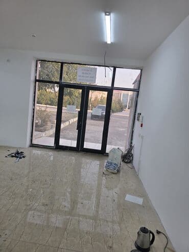 продажа и аренда домов: İcarəyə obyekt - 1-ci mərtəbədə geniş vitrinli giriş qapısı olan — 4