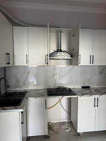 kunc dolablar: Mətbəx üçün quraşdırılmış komplekt təqdim olunur. Şəkillərdə ağ rəngli — 1