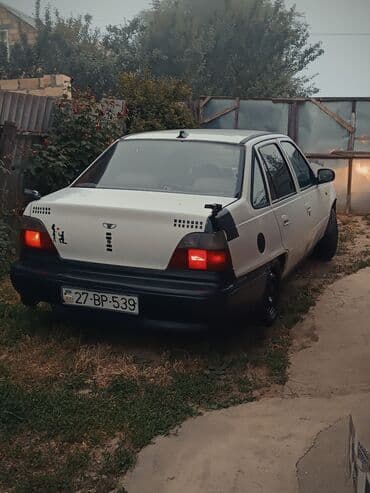 diski barter: Daewoo Nexia: 1.5 l | 1996 il Sedan — 6