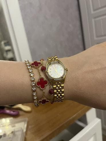 Citizen qadın qol saatı orijinaldır VMF den alınıb yarı qiymetine