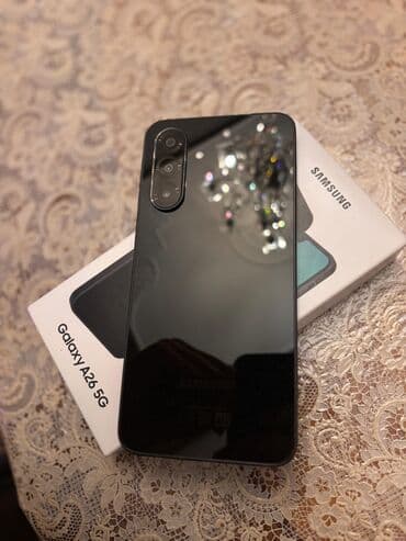 Бытовая техника: Samsung Galaxy A26 5G, 128 ГБ, цвет - Черный, Отпечаток пальца, Две SIM карты, Face ID — 3