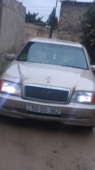 nomre altligi: Mercedes-Benz C 200 (W202) sedan - Kuzov: sedan, qızılı/bej rəng - — 7