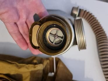 Sovet dövrünə aid qaz maskası dəsti Məhsulun tərkibi: - Kauçukdan — 10