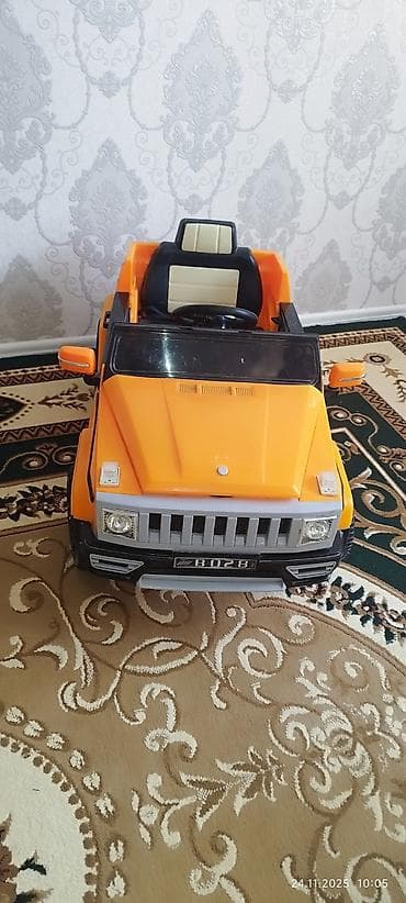 uşaq ucun ev: Uşaq üçün elektrikli minik maşını – narıncı rəngdə, yolsuzluq — 4