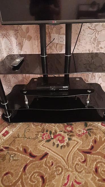 divar kitab refleri: LG televizor + şüşə TV stendi (dəst) Məhsulun tərkibi: - LG LED — 3