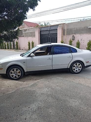 qar zenciri: Volkswagen Passat: 1.8 l | 2002 il Sedan — 1