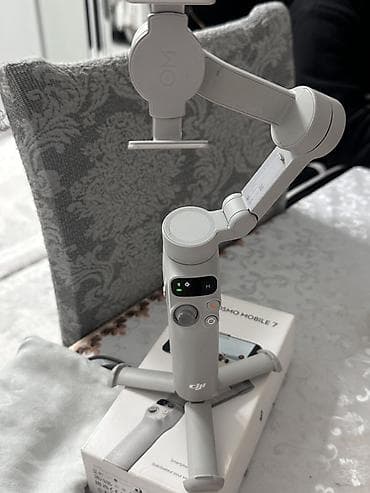 DJI Osmo Mobile 7 – smartfon üçün 3 oxlu stabilizator Xüsusiyyətlər lalafo.az -da DJI Osmo Mobile 7 – smartfon üçün 3 oxlu stabilizator Xüsusiyyətlər