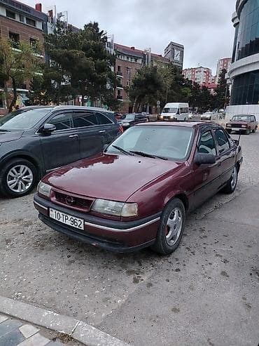 vaz 2107 paxlava salon: Opel Vectra sedan - Korpus: 4 qapılı sedan, tünd bordo rəng - Nömrə — 7