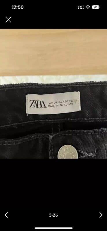 zeynep bastik baku: Zara Qara rəngli, yırtıq detallı cins şalvar. Dizlərdə və digər — 24