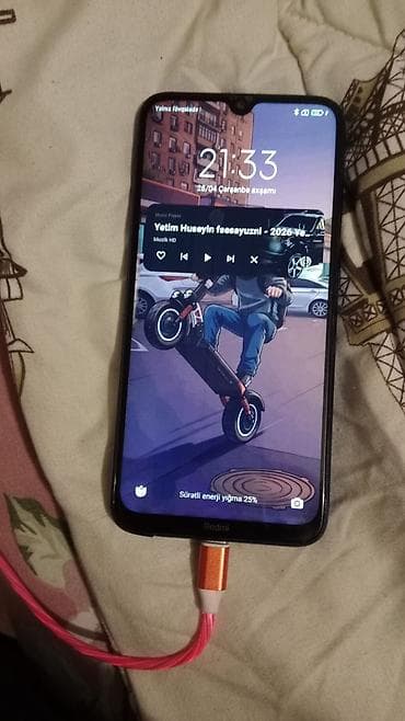 newtech kamera: Xiaomi Redmi (mavi rəng) - Ekran: damla-notçlu tam ekran. Şüşədə — 3