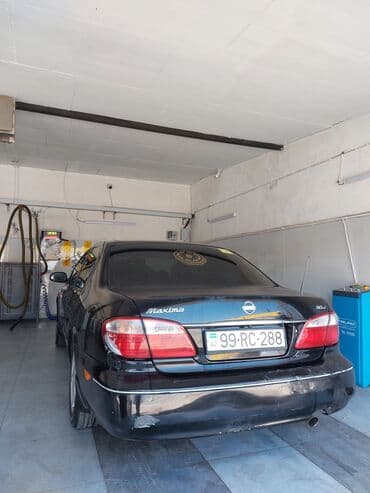 afdamabiler: Nissan Maxima: 2 l | 2006 il Sedan — 9