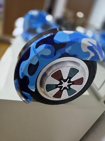 Məhsul: Elektrik hoverboard (self‑balancing skuter) Xüsusiyyətlər: - — 6