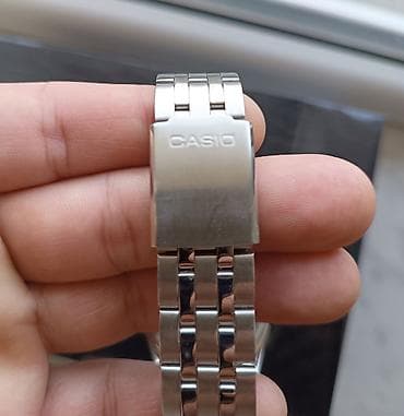 dini saat: Casio kişi qol saatı - Model: MTP seriyası (arxa qapaqda MTP-1383 — 2