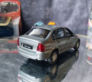 metbex tavan modelleri: Коллекционная модель Lada Kalina VAZ1118 silver 2004 Welly Scale — 10
