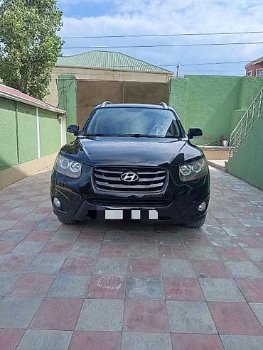 encar kia sorento: Hyundai Santa Fe: 2 l | 2010 il Krossover — 2