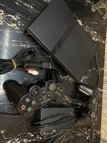 iphone x aksesuar: PlayStation 2 Slim oyun konsolu: 2 pult var 1 eded orjinal digəri isə — 2