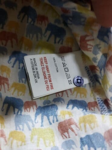 Donlar: 6 aylıq qız uşağına gedir.Fil motivli naxışlarla bəzədilmiş ağ rəngli — 3